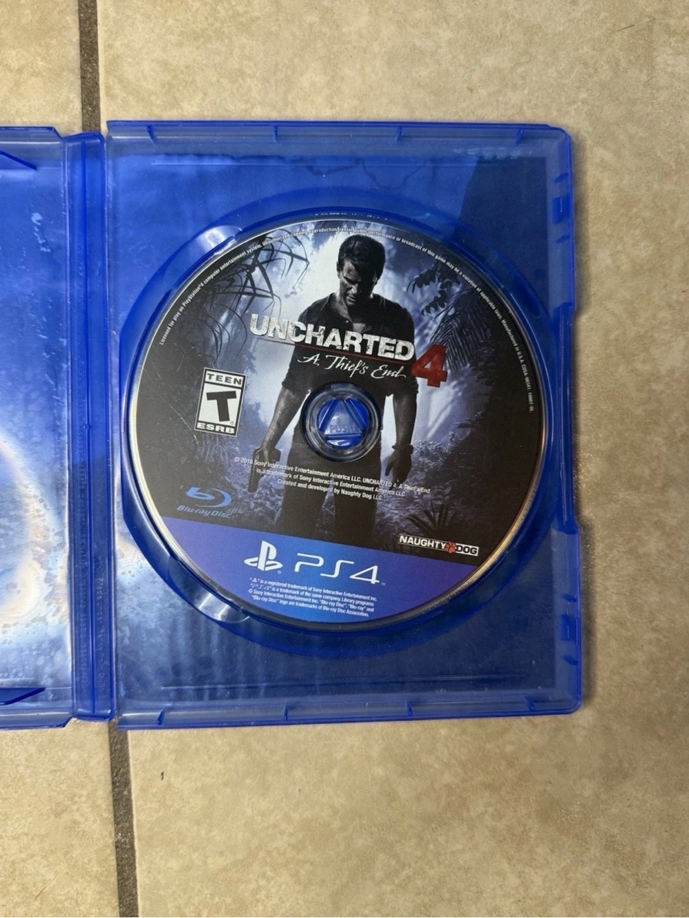 Uncharted 4: A Thief's End PS4 Game Disc - Blue